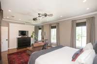 Master bedroom with storage behind the television