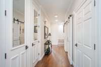 Hallway on second level between master and guest suite. Laundry is also on this level.