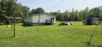 Side and back view of home. pump house is to your right.