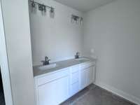 Primary bath - white quartz counters with two square under-mount sinks