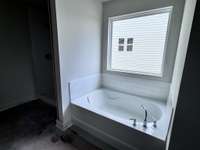 Primary bath - garden tub with tile surround