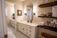 Bathroom 3 with 2 vanities and a shower tub combo.