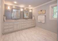 Primary suite Bath with double vanities and shower