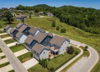 Aerial view of 9556 Faulkner Square side yard~Plenty of room for a trampoline, play set, volleyball net and/or private pool~Surrounded by common area!