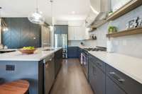 In the hallway near the refrigerator, you'll find a large pantry with built-in shelves!