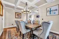 Formal dining room with coffered ceiling