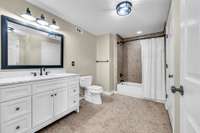 Large bathroom with shower/tub & closet for storage