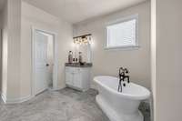 soaking tub & separate toilet area