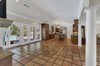 Gorgeous, warm Saltillo tiles.  Perfect spot for a gathering room off kitchen.