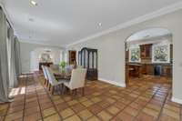 Opposite end of dining room looking into kitchen and toward foyer.