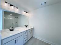 Hall bath with dual vanity