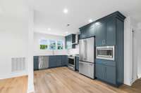 L-shaped kitchen in the detached apartment.