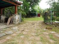 Stepping stone area connecting 2 areas of back yard