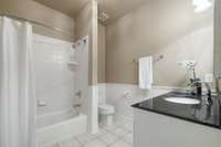 Full Bathroom upstairs to service additional bedrooms. Ceramic tile and granite countertop.