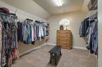 Walk-in Primary closet has room for all of your clothes and more!