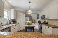 Tons of great cabinet space and Walk-in Pantry.