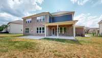 Outdoor living is easy with the large covered porch that is wired for a ceiling fan and for a TV for watching games and movies while enjoying the beauty of the open space and views of the hills