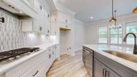 Cooking is a delight in this cheerful, beautiful Kitchen with upgraded appliances and plenty of prep space