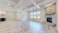 Light filled Great Room flows to the Gourmet Kitchen and Breakfast Room* Coffered ceiling and an abundance of recessed lights create a wonderful room for family and guests to relax and have conversations