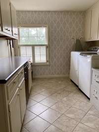 Large 123 sq ft laundry room with lots of storage