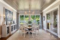 Breakfast/casual dining area looking out to flower garden