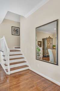 Now let's go upstairs.  A gentle split stair leads to the upstairs bedrooms.