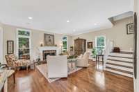 Charming open stairway to the upstairs bedrooms.