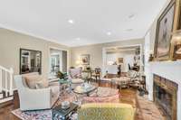 Speaking of open floor plans, the family/living room opens to the breakfast room and doors to the back deck and patio.