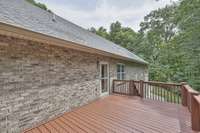 The oversized deck is just a few steps from the kitchen, making it the perfect spot to sit, relax, and grill.