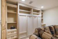 Custom murphy bed allowing guests place to stay in apartment in addition to bedroom.