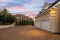 Side two car garage with ample parking.