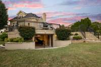 A unique feature of this property is the below-deck storage garage, perfect for storing water equipment and offering additional living or hobby space.