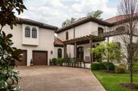 multiple outdoor living areas. Pictured here is the side patio terrace.