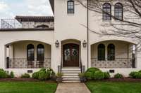 beautifully manicured front porch