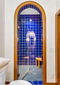 downstairs bath with beautiful Saltillo tile floor