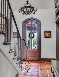 separate entrance to stairway leading to in-law suite above garage