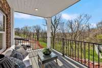 Balcony off main level bedroom! *Photo is of model home, actual features and finishes may vary.