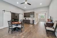 What a great Entertaining Space! The bonus room features hardwood flooring, ceiling fan, and a built-in wet bar with mini refrigerator, microwave, tile backspash, sink and wine racks.