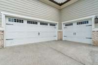 The 3-Car Garage features plenty of room for a second refrigerator or freezer, a tankless water heater and space for a future workbench and additional storage.