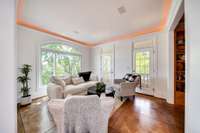 Crown molding with lighting accents the room.