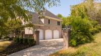 3 car garage with Courtyard Area for Basketball...pickleball?