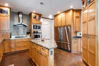 The kitchen island provides a great prep area.