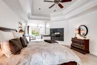 Primary Bedroom also features a ceiling fan and crown molding.