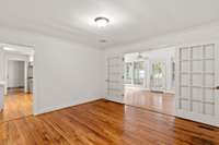 Dining Room accessed from foyer, leading to sunroom. adjacent to kitchen