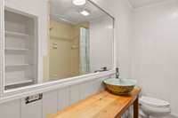 hallways full bath with tiled shower tub combo