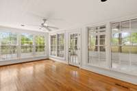 sunroom leading to covered porch