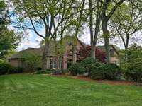 This side yard has ample space for playtime - soccer practice, flag football at Thanksgiving or playing fetch with your furry friend.  There is room for it all!