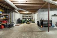 Second unfinished storage space in the basement, but really functions more like a 4th garage.  Store your lawn equipment, woodworking equipment, sporting gear - and you can access it from the exterior pedestrian door!