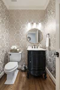 First floor powder room (please note mirror does not convey).