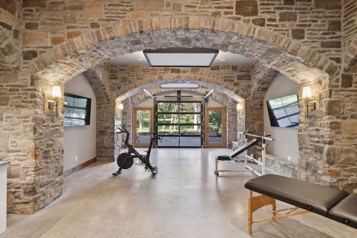 Gym with roll-up door on lower level